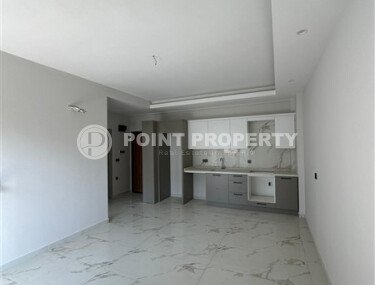 A spacious and cozy 1+1 apartment of 55 m² in a modern residential complex with well-developed infrastructure in Tosmur-id-10290-photo-2
