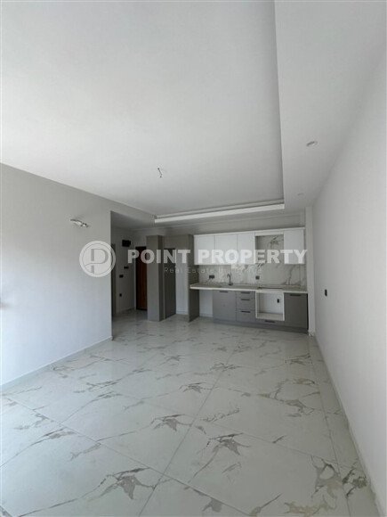 A spacious and cozy 1+1 apartment of 55 m² in a modern residential complex with well-developed infrastructure in Tosmur-id-10290-photo-2