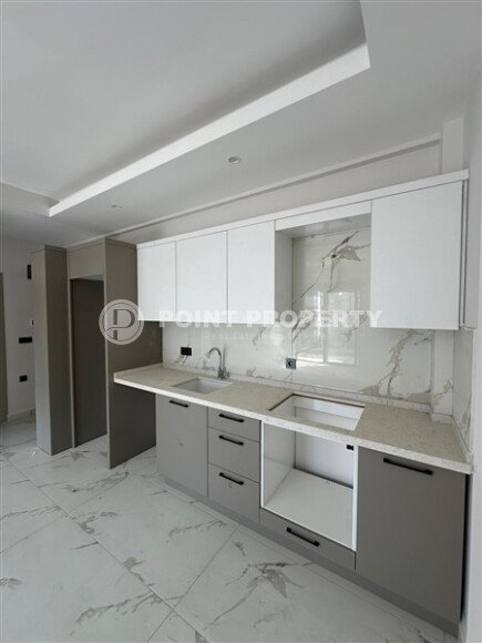 A spacious and cozy 1+1 apartment of 55 m² in a modern residential complex with well-developed infrastructure in Tosmur-id-10290-photo-3