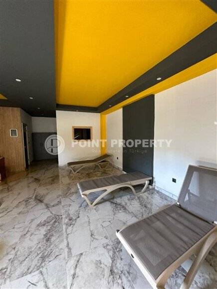 A spacious and cozy 1+1 apartment of 55 m² in a modern residential complex with well-developed infrastructure in Tosmur-id-10290-photo-11