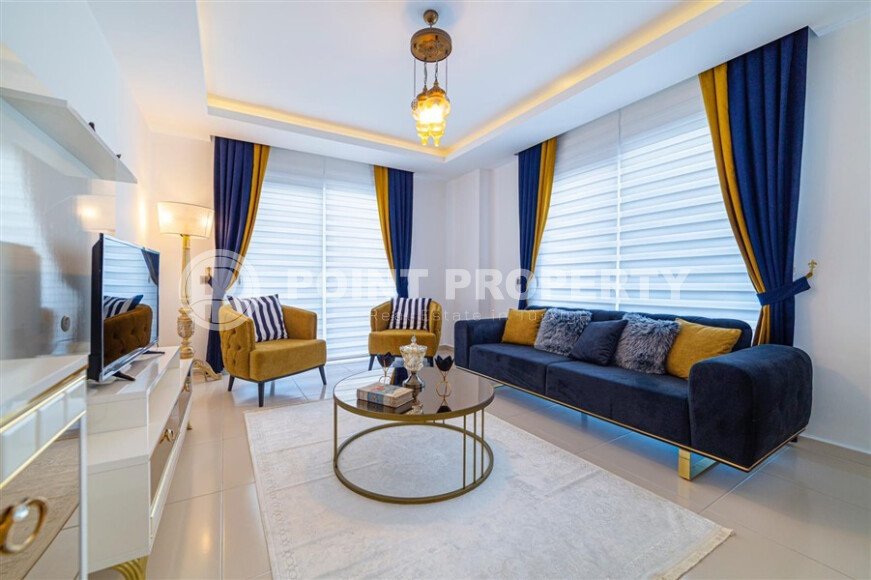 Spacious 1+1 apartment 70 m2 with new furniture and appliances in Mahmutlar-id-10295-photo-1