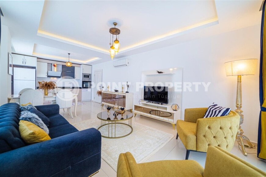 Spacious 1+1 apartment 70 m2 with new furniture and appliances in Mahmutlar-id-10295-photo-2