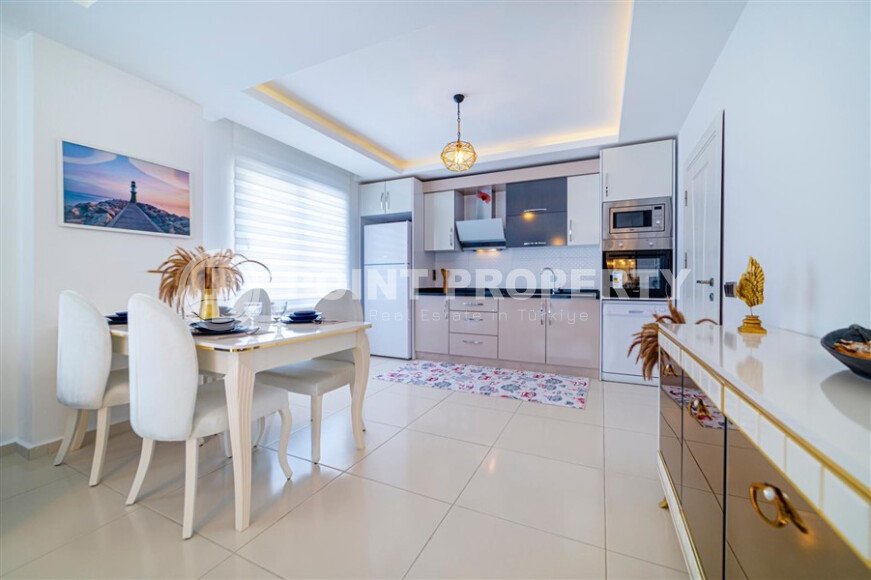 Spacious 1+1 apartment 70 m2 with new furniture and appliances in Mahmutlar-id-10295-photo-3