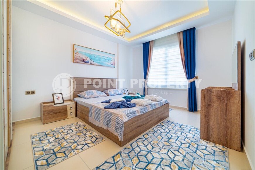 Spacious 1+1 apartment 70 m2 with new furniture and appliances in Mahmutlar-id-10295-photo-5