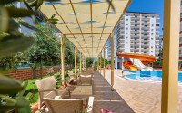 Spacious 1+1 apartment 70 m2 with new furniture and appliances in Mahmutlar-id-10295-photo-18