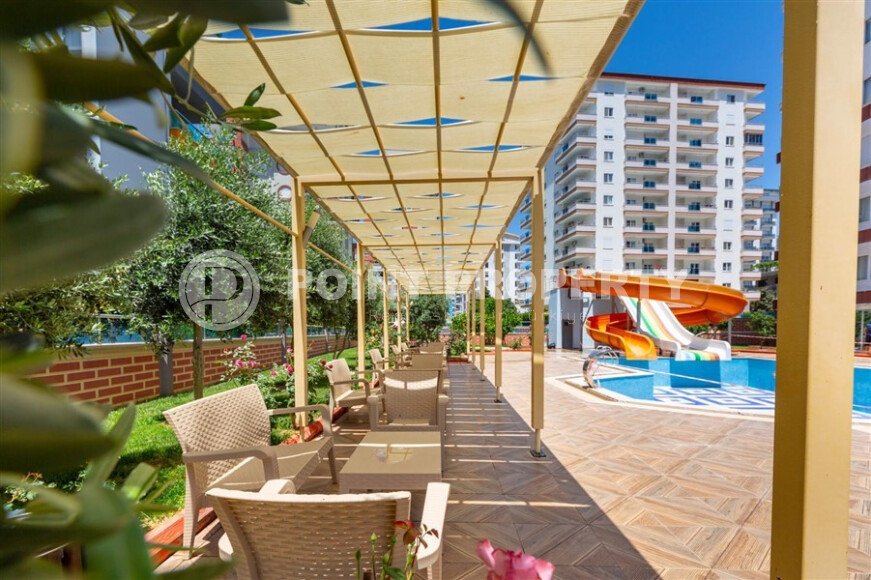 Spacious 1+1 apartment 70 m2 with new furniture and appliances in Mahmutlar-id-10295-photo-18