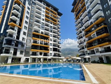 Квартира 1+1 в комплексе с развитой инфраструктурой в Махмутларе-id-10296-фото-2