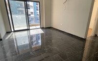 1+1 apartment in a complex with developed infrastructure in Mahmutlar-id-10296-photo-3