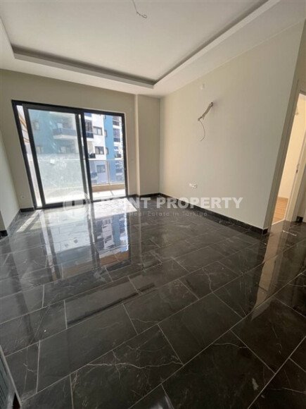 1+1 apartment in a complex with developed infrastructure in Mahmutlar-id-10296-photo-3