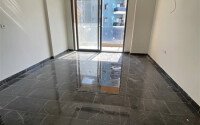 1+1 apartment in a complex with developed infrastructure in Mahmutlar-id-10296-photo-4