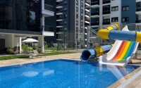1+1 apartment in a complex with developed infrastructure in Mahmutlar-id-10296-photo-7