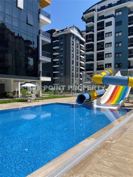 1+1 apartment in a complex with developed infrastructure in Mahmutlar-id-10296-photo-7