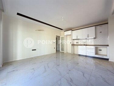 A modern, spacious 70 m² apartment in a new complex with rich infrastructure in the Oba area of Alanya-id-10299-photo-7