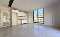 Современная просторная квартира 70 м² в новом комплексе с богатой инфраструктурой в районе Оба, Аланья-id-10299-фото-2
