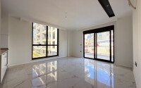 Современная просторная квартира 70 м² в новом комплексе с богатой инфраструктурой в районе Оба, Аланья-id-10299-фото-3