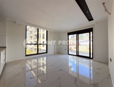 A modern, spacious 70 m² apartment in a new complex with rich infrastructure in the Oba area of Alanya-id-10299-photo-3