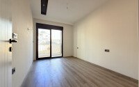 Современная просторная квартира 70 м² в новом комплексе с богатой инфраструктурой в районе Оба, Аланья-id-10299-фото-4