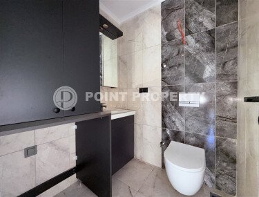 A modern, spacious 70 m² apartment in a new complex with rich infrastructure in the Oba area of Alanya-id-10299-photo-5