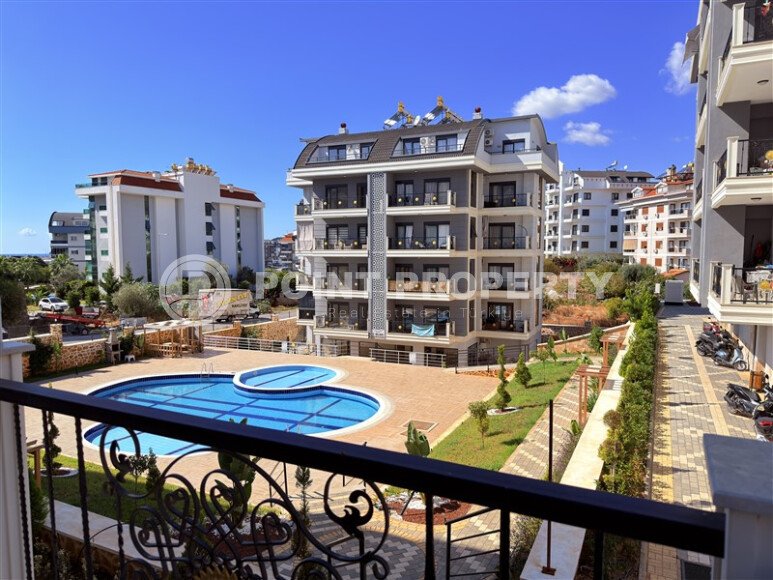 Современная просторная квартира 70 м² в новом комплексе с богатой инфраструктурой в районе Оба, Аланья-id-10299-фото-9