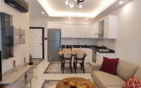 Стильная современная квартира 55 м² в новом жилом комплексе класса люкс в Махмутларе, Аланья-id-10304-фото-2