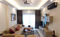 Стильная современная квартира 55 м² в новом жилом комплексе класса люкс в Махмутларе, Аланья-id-10304-фото-3