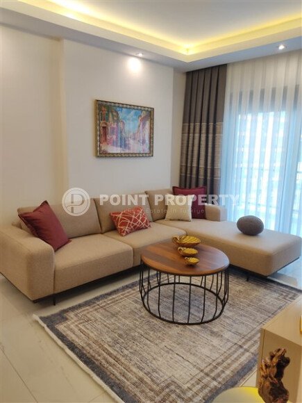 Стильная современная квартира 55 м² в новом жилом комплексе класса люкс в Махмутларе, Аланья-id-10304-фото-4