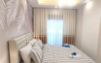 Стильная современная квартира 55 м² в новом жилом комплексе класса люкс в Махмутларе, Аланья-id-10304-фото-5