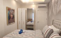 Стильная современная квартира 55 м² в новом жилом комплексе класса люкс в Махмутларе, Аланья-id-10304-фото-6