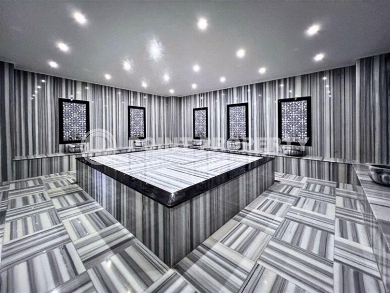 Стильная современная квартира 55 м² в новом жилом комплексе класса люкс в Махмутларе, Аланья-id-10304-фото-13