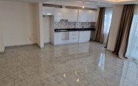 Просторная современная квартира 110 м² в престижном комплексе с развитой инфраструктурой в Махмутларе, Аланья-id-10305-фото-4