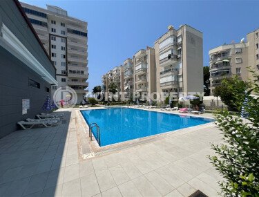 2+1 apartment with partial sea view in a complex on the first line in Mahmutlar-id-10309-photo-7