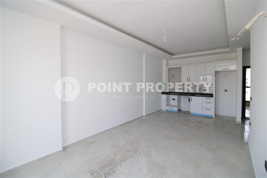 1+1 apartment in a new residential complex in Mahmutlar-id-10311-photo-3