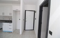 1+1 apartment in a new residential complex in Mahmutlar-id-10311-photo-5