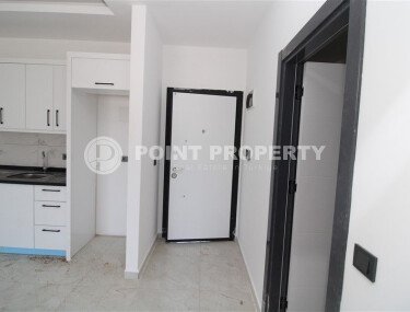 1+1 apartment in a new residential complex in Mahmutlar-id-10311-photo-5