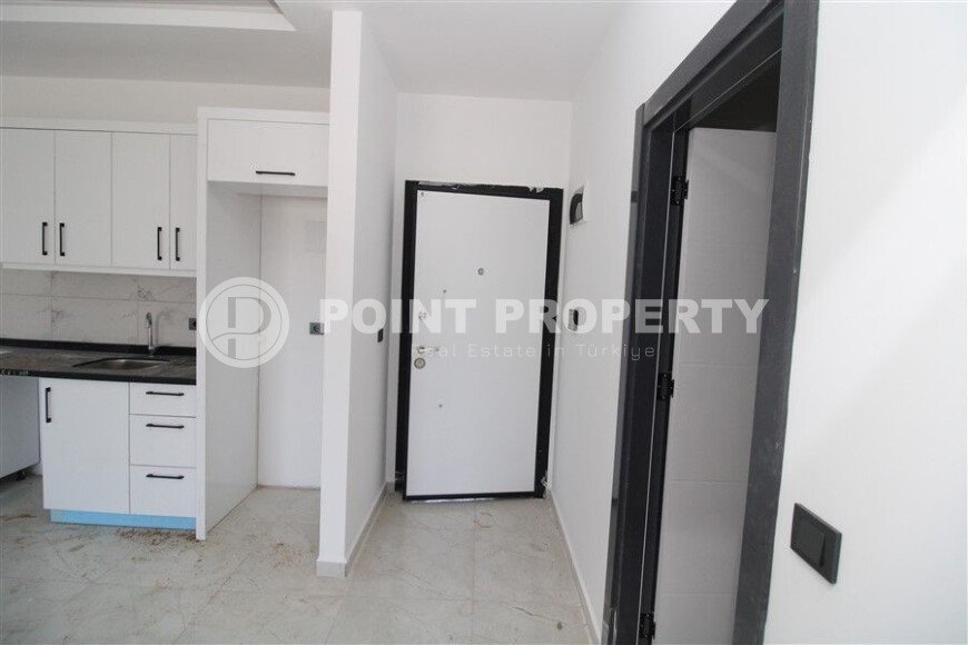 1+1 apartment in a new residential complex in Mahmutlar-id-10311-photo-5