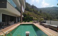 An elegant 351 m² villa with a panoramic terrace and sea views in a prestigious area of Alanya-id-10313-photo-1