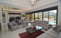 An elegant 351 m² villa with a panoramic terrace and sea views in a prestigious area of Alanya-id-10313-photo-4