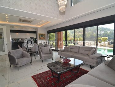 An elegant 351 m² villa with a panoramic terrace and sea views in a prestigious area of Alanya-id-10313-photo-4