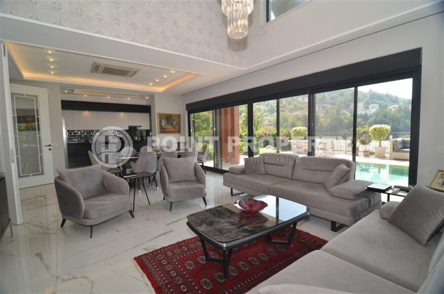 An elegant 351 m² villa with a panoramic terrace and sea views in a prestigious area of Alanya-id-10313-photo-4