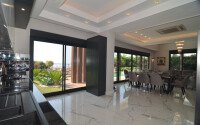 An elegant 351 m² villa with a panoramic terrace and sea views in a prestigious area of Alanya-id-10313-photo-7