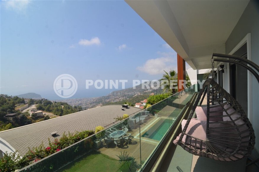 An elegant 351 m² villa with a panoramic terrace and sea views in a prestigious area of Alanya-id-10313-photo-13
