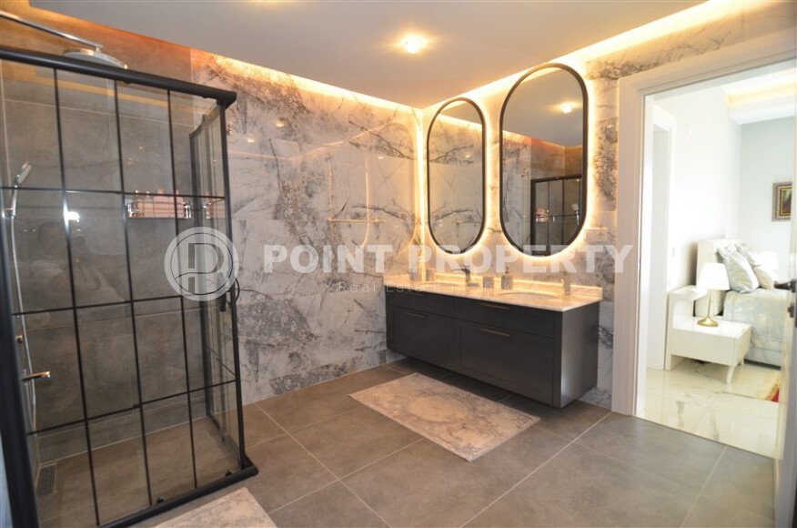 An elegant 351 m² villa with a panoramic terrace and sea views in a prestigious area of Alanya-id-10313-photo-15