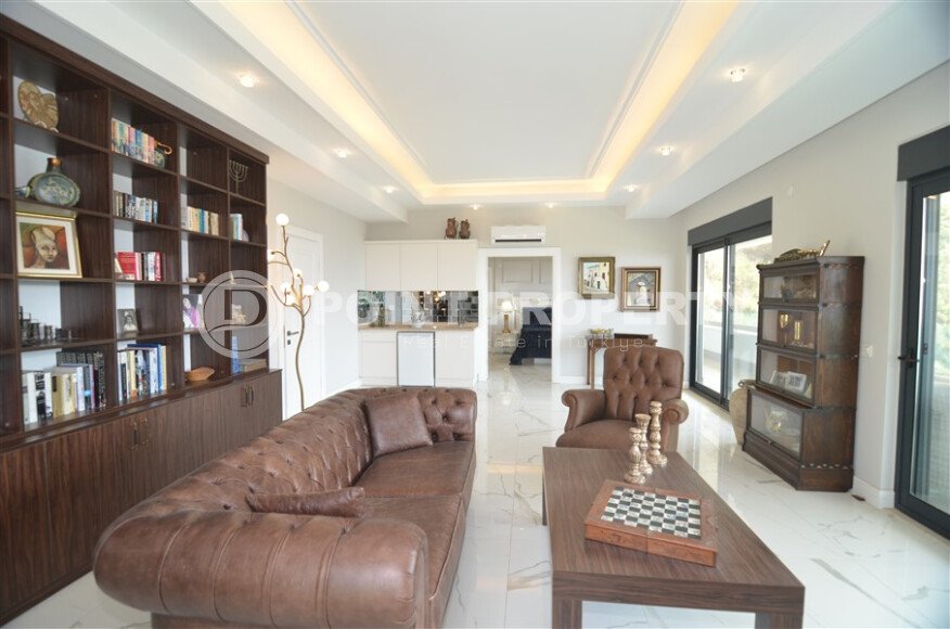 An elegant 351 m² villa with a panoramic terrace and sea views in a prestigious area of Alanya-id-10313-photo-16
