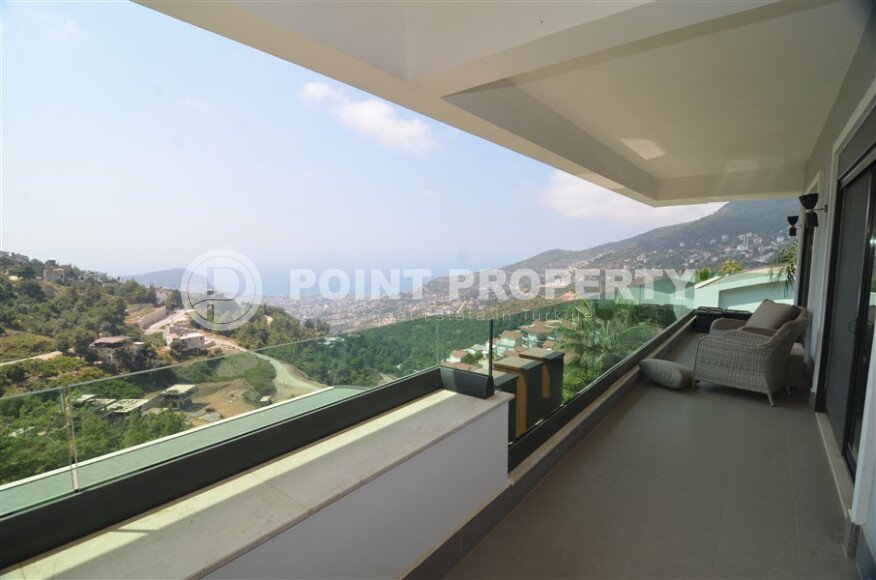 An elegant 351 m² villa with a panoramic terrace and sea views in a prestigious area of Alanya-id-10313-photo-17