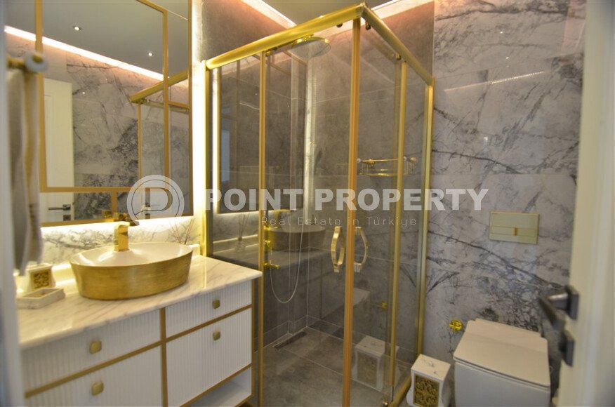 An elegant 351 m² villa with a panoramic terrace and sea views in a prestigious area of Alanya-id-10313-photo-21