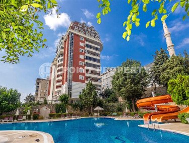 A bright 100 m² apartment in a cozy complex with a swimming pool and infrastructure in the Cikcilli area.-id-10314-photo-1