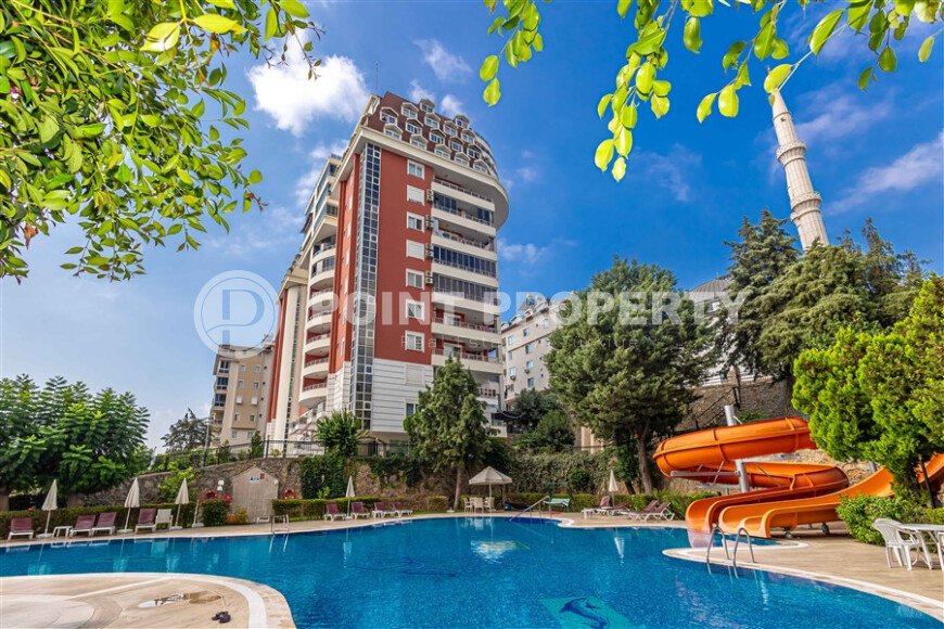 A bright 100 m² apartment in a cozy complex with a swimming pool and infrastructure in the Cikcilli area.-id-10314-photo-1