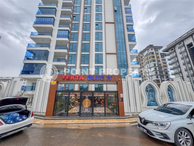 A modern, bright 1+1 apartment of 58 m² in a residential complex with developed infrastructure in the Mahmutlar area-id-10319-photo-1