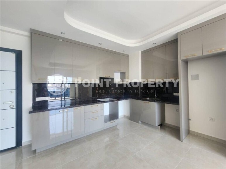 A modern, bright 1+1 apartment of 58 m² in a residential complex with developed infrastructure in the Mahmutlar area-id-10319-photo-2