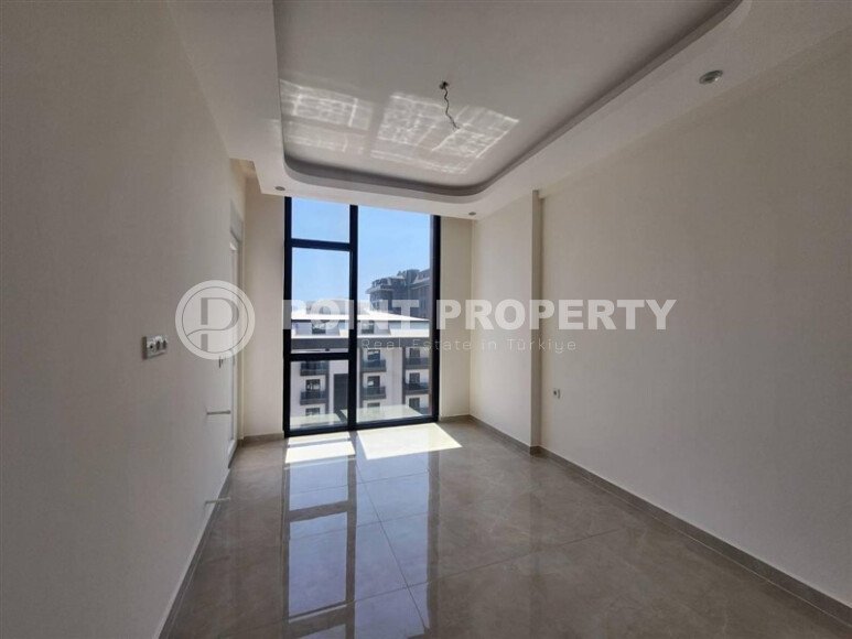 A modern, bright 1+1 apartment of 58 m² in a residential complex with developed infrastructure in the Mahmutlar area-id-10319-photo-5